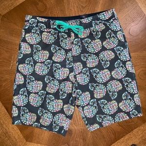 DIVIDED men’s swimming trunks